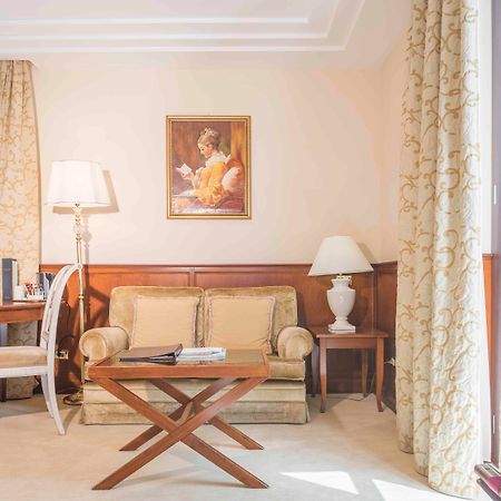 Golden Tower Hotel & Spa Florencia Exterior foto A suite at the Hotel de France