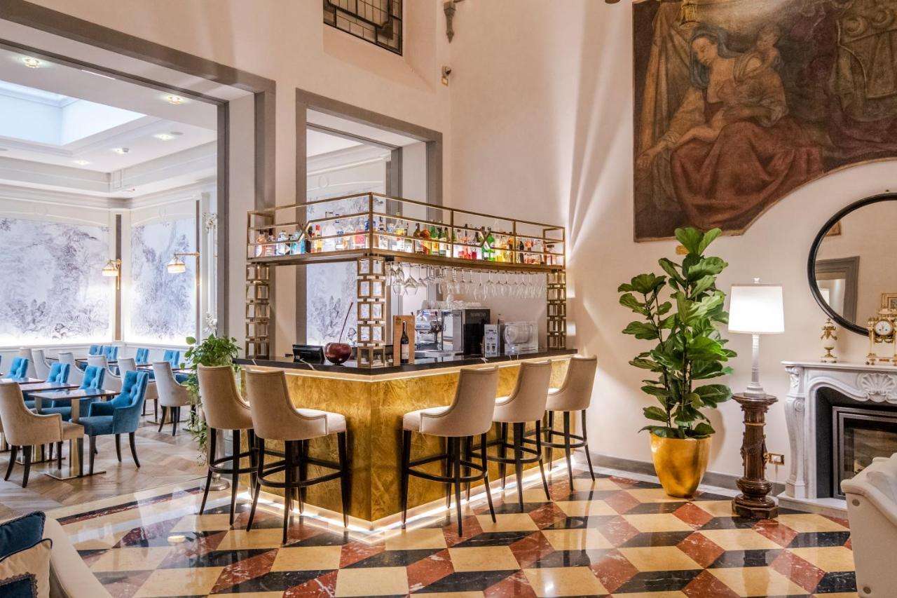 Golden Tower Hotel & Spa Florencia Exterior foto The bar at the hotel