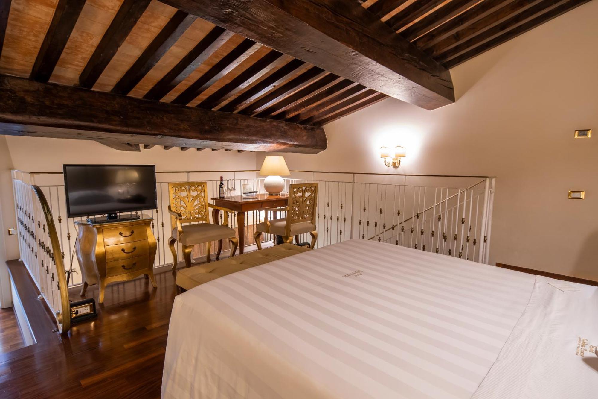 Golden Tower Hotel & Spa Florencia Exterior foto A room at the hotel
