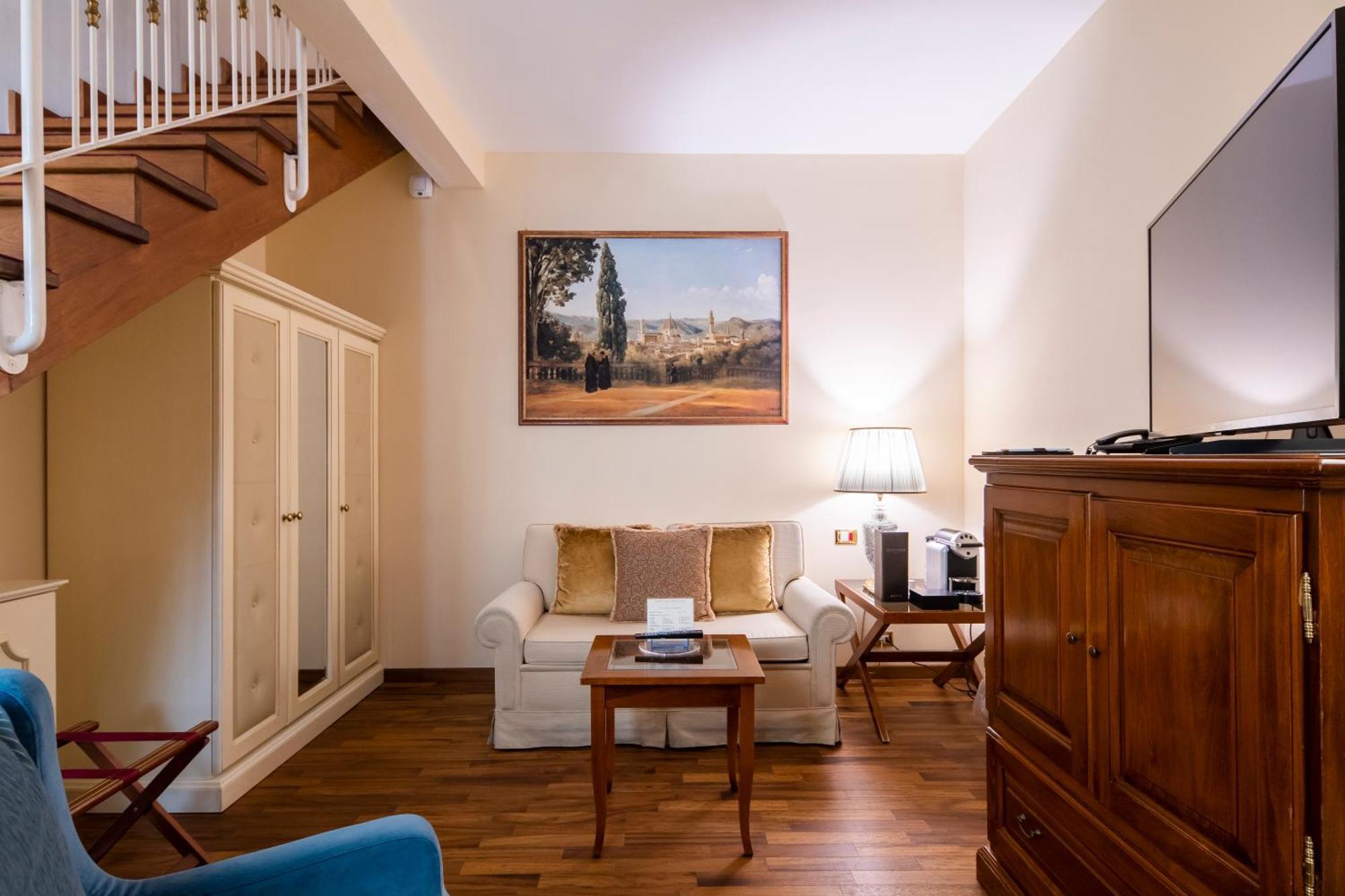 Golden Tower Hotel & Spa Florencia Exterior foto A room at the hotel