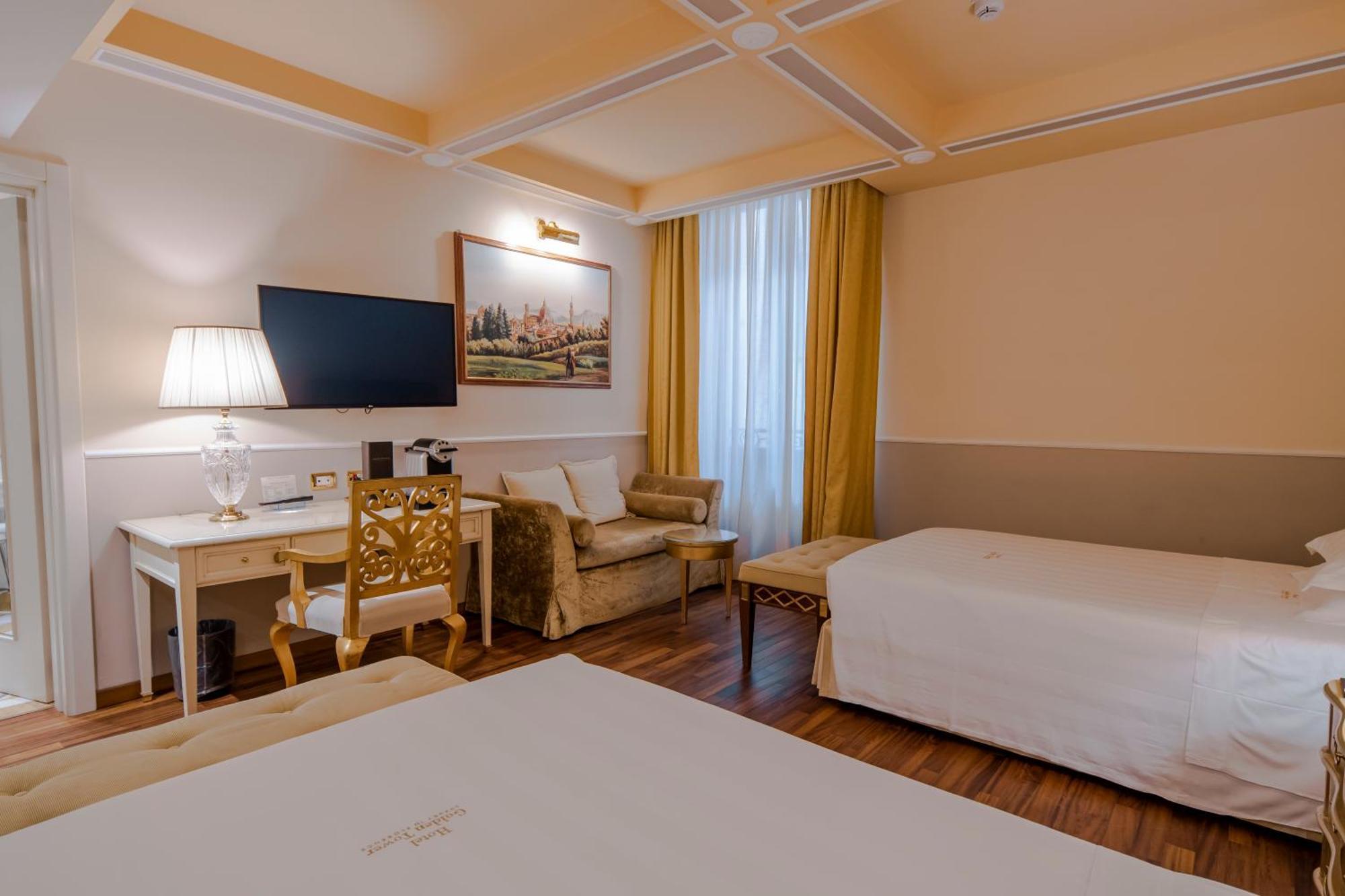 Golden Tower Hotel & Spa Florencia Exterior foto A room at the hotel
