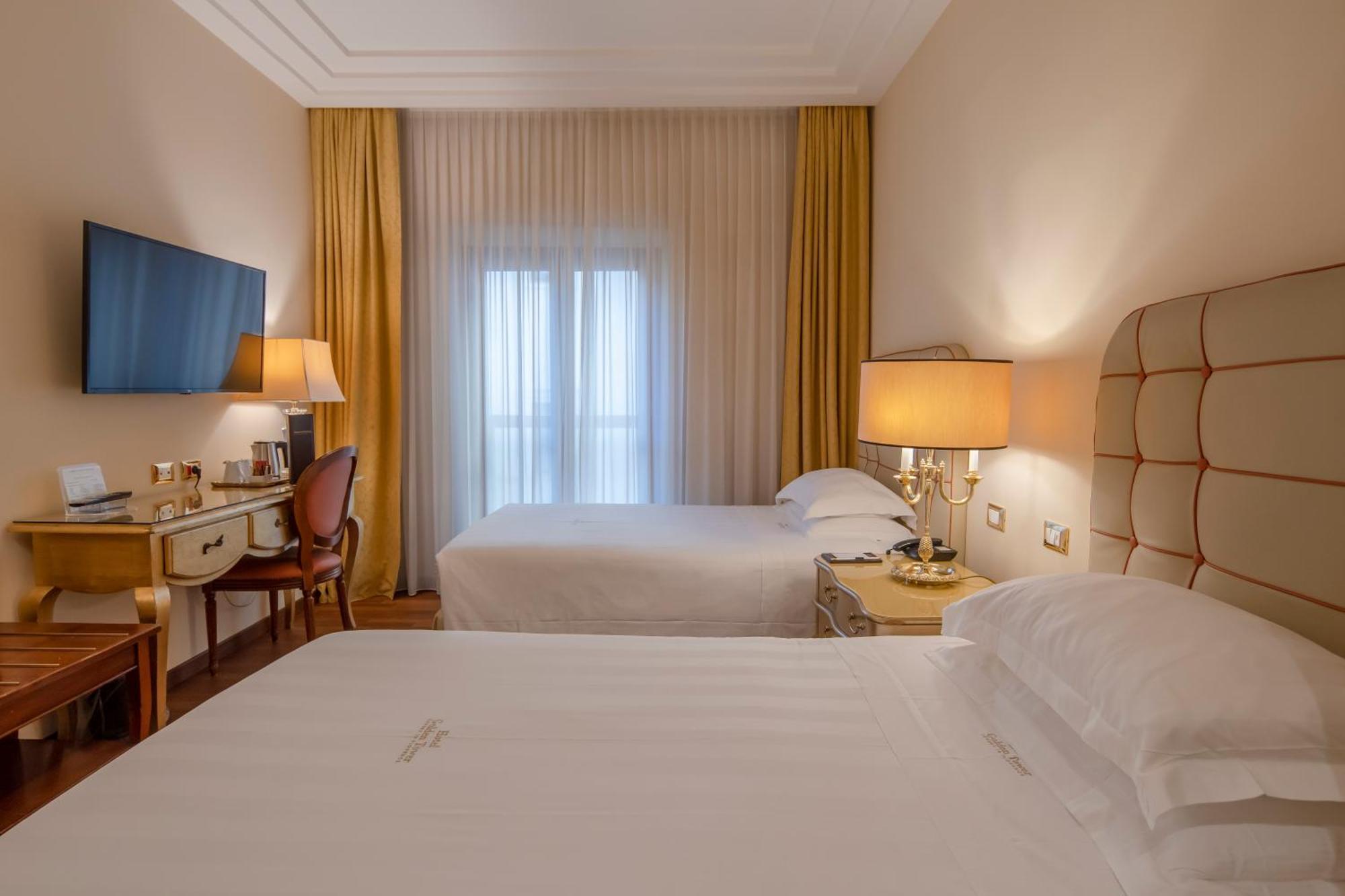 Golden Tower Hotel & Spa Florencia Exterior foto A room at the hotel