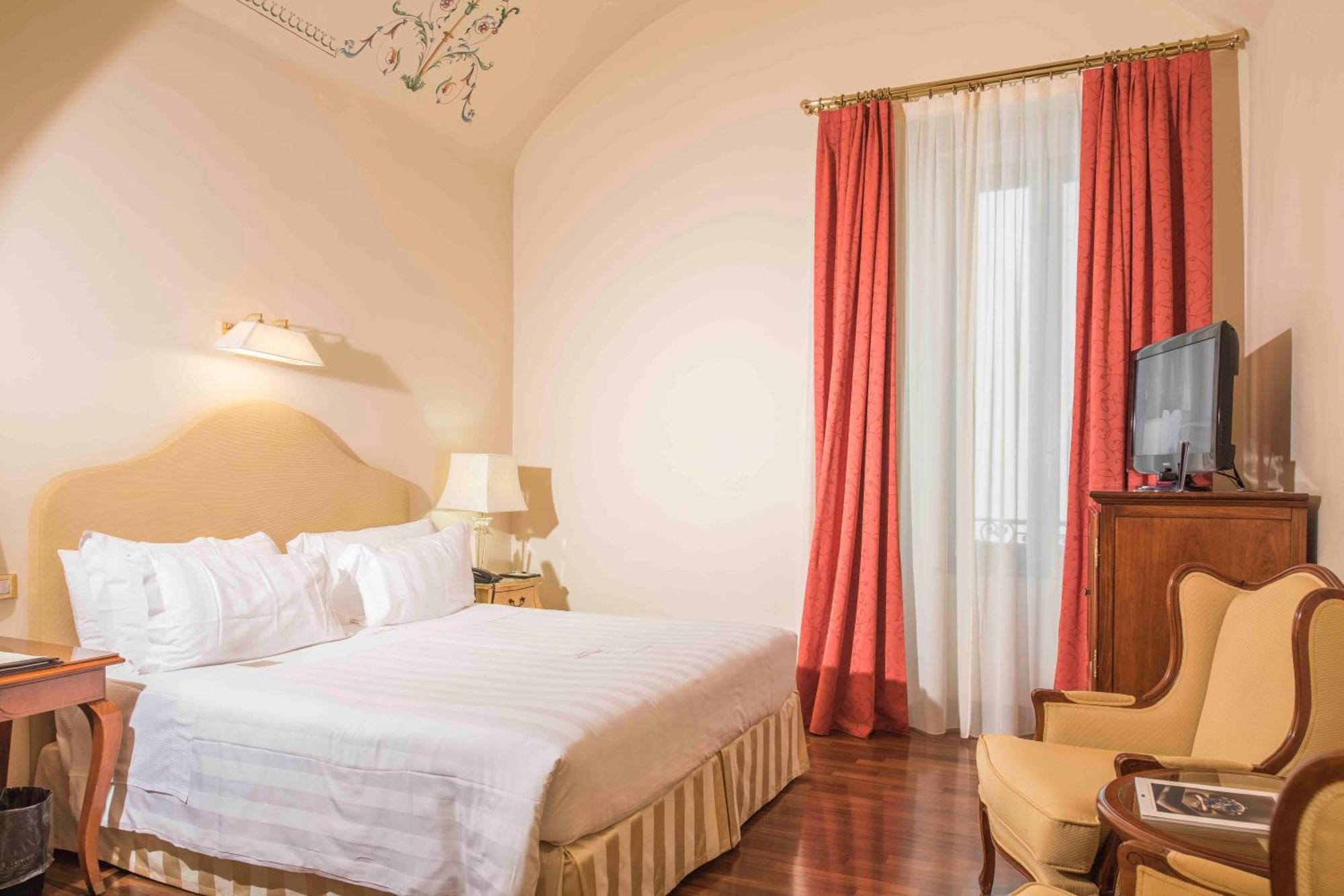 Golden Tower Hotel & Spa Florencia Exterior foto A room at the hotel