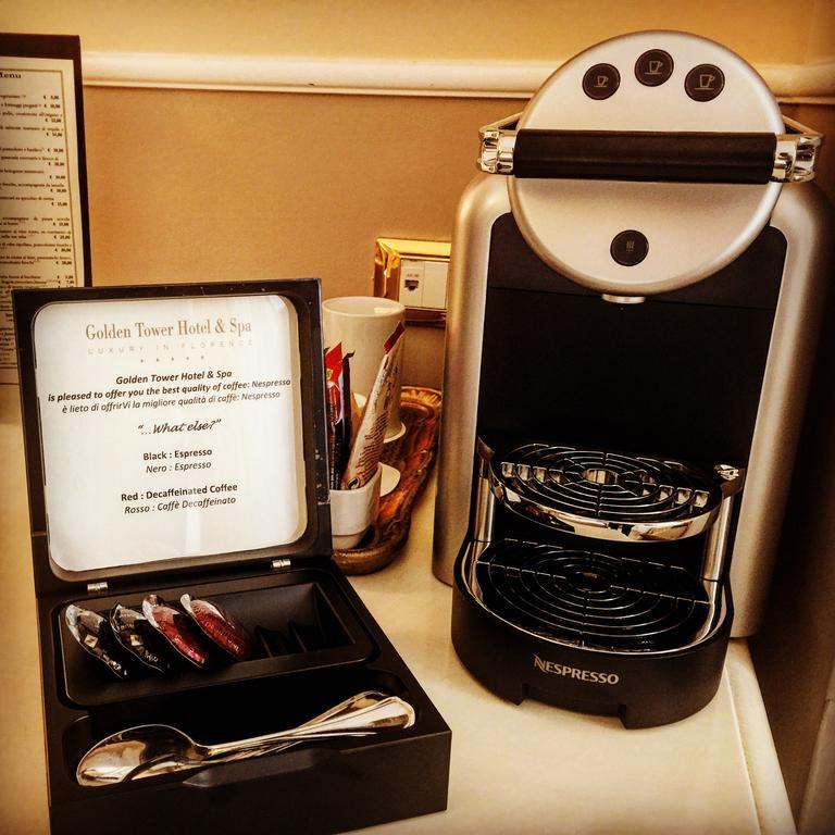 Golden Tower Hotel & Spa Florencia Exterior foto A Nespresso coffee machine